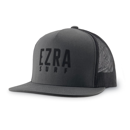 Black and gray trucker cap with 'EZRA SURF' text on a white background