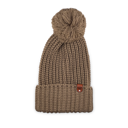 Tan color knitted beanie toque with a pom-pom on a white background