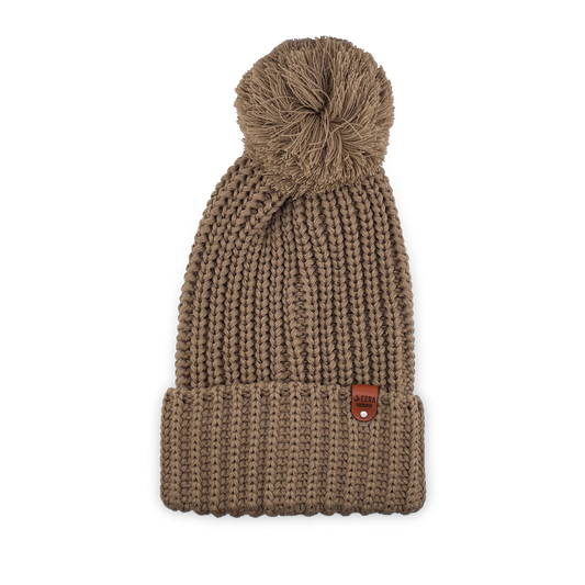 Tan color knitted beanie toque with a pom-pom on a white background